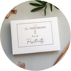 White & simple Poppleberry presentation box for A6 Positivity Postcards, with small grey bunny (the Popplebunny) illustration