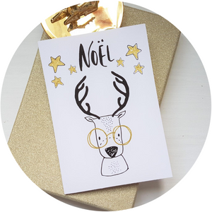 Poppleberry A6 'Noel' Scandinavian - Inspired Christmas Card with Reindeer wearing golden glasses under golden stars on white cardstock.
