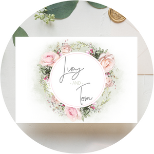 Blush & sage floral wreath A6 Poppleberry accordion fold all-in-one wedding invitation, folded with matching envelope.