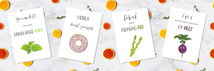 4 Poppleberry A6 positivity postcards, with food illustrations & uplifting puns, on white cardstock.