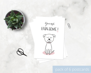 Poppleberry A6 positivity postcard, with a smiling white puppy dog illustration and uplifting message, on white cardstock.