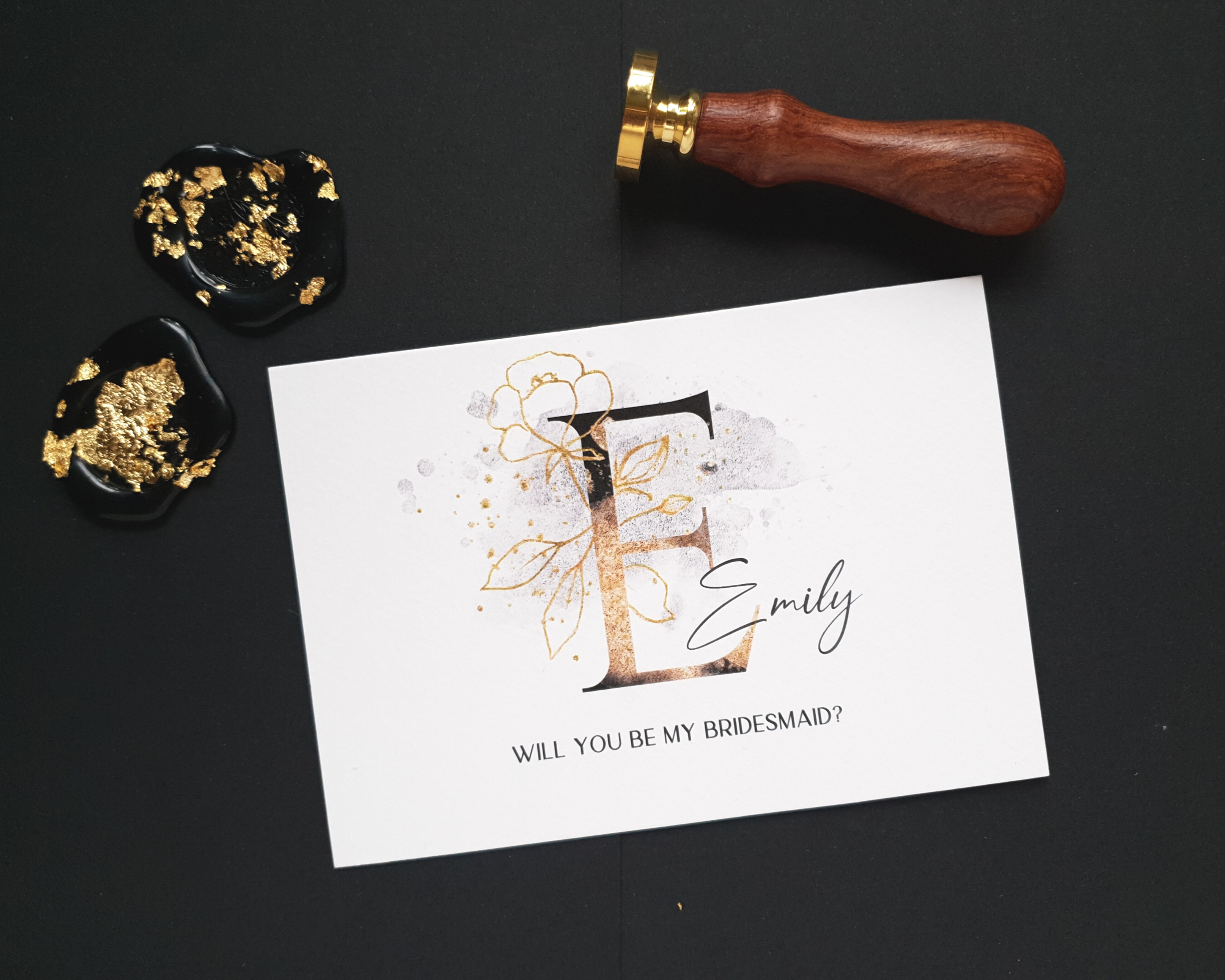Front of a black & gold sparkle A6 Poppleberry 'Will you be my...?' bridesmaid proposal card with personalised name