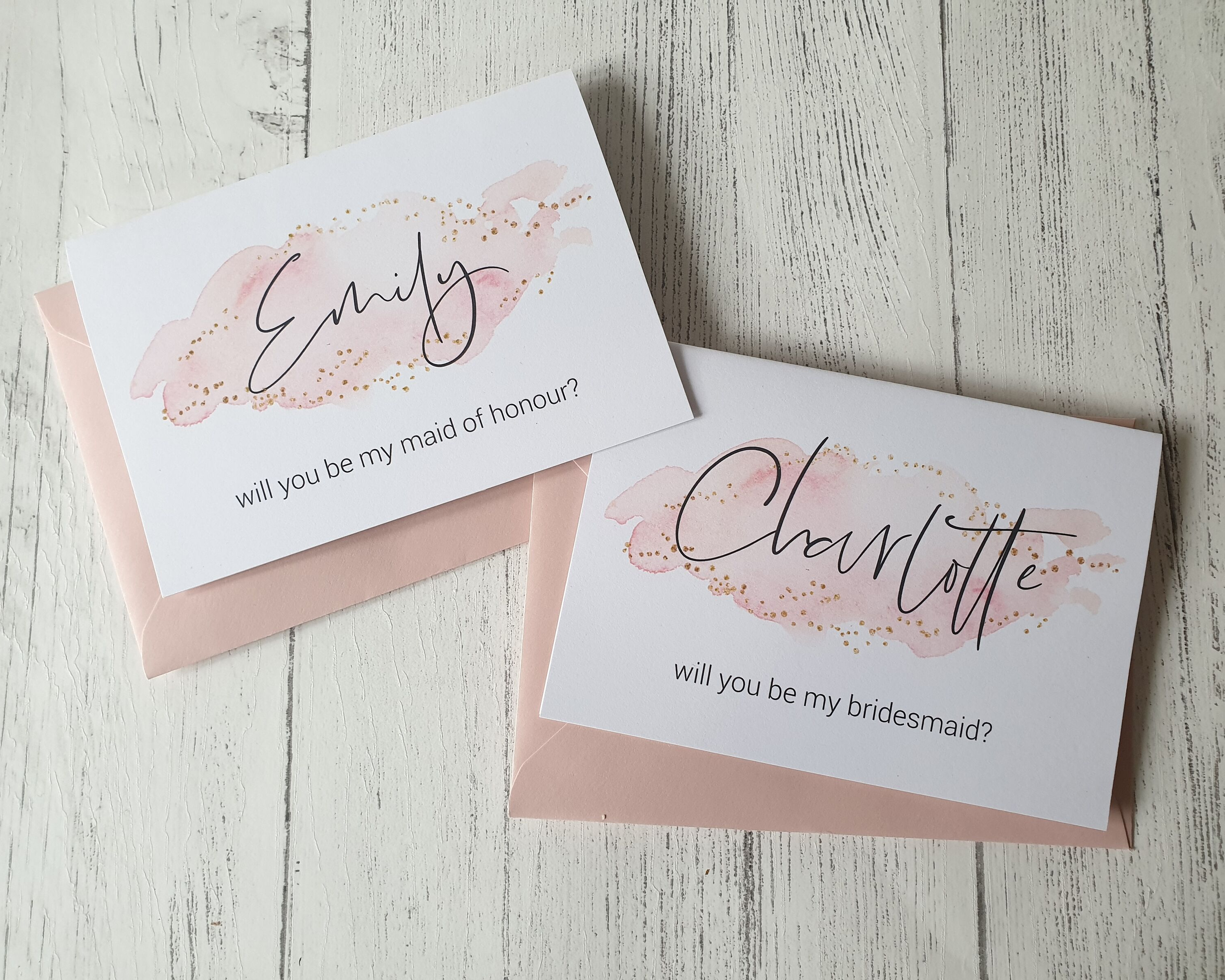 2 blush pink A6 Poppleberry 'Will you be my...?' bridesmaid proposal cards with personalised names on blush pink envelopes