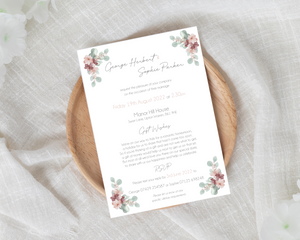 Dusty pink & grey foliage A6 Poppleberry wedding evening / reception invitation on white cardstock, laid on wooden plate.