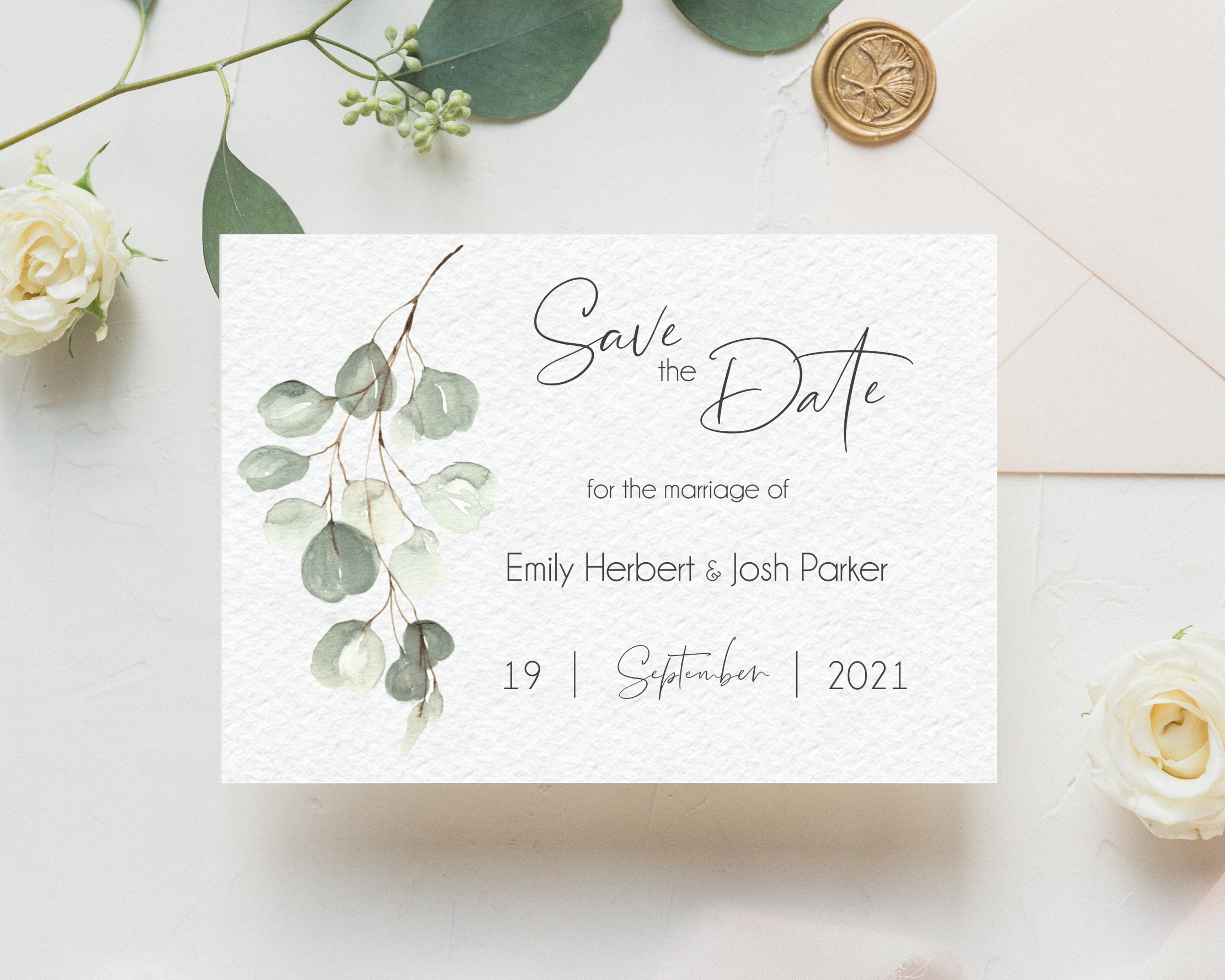 Muted green eucalyptus Poppleberry A6 wedding save the date card, with eucalyptus leaves in background.