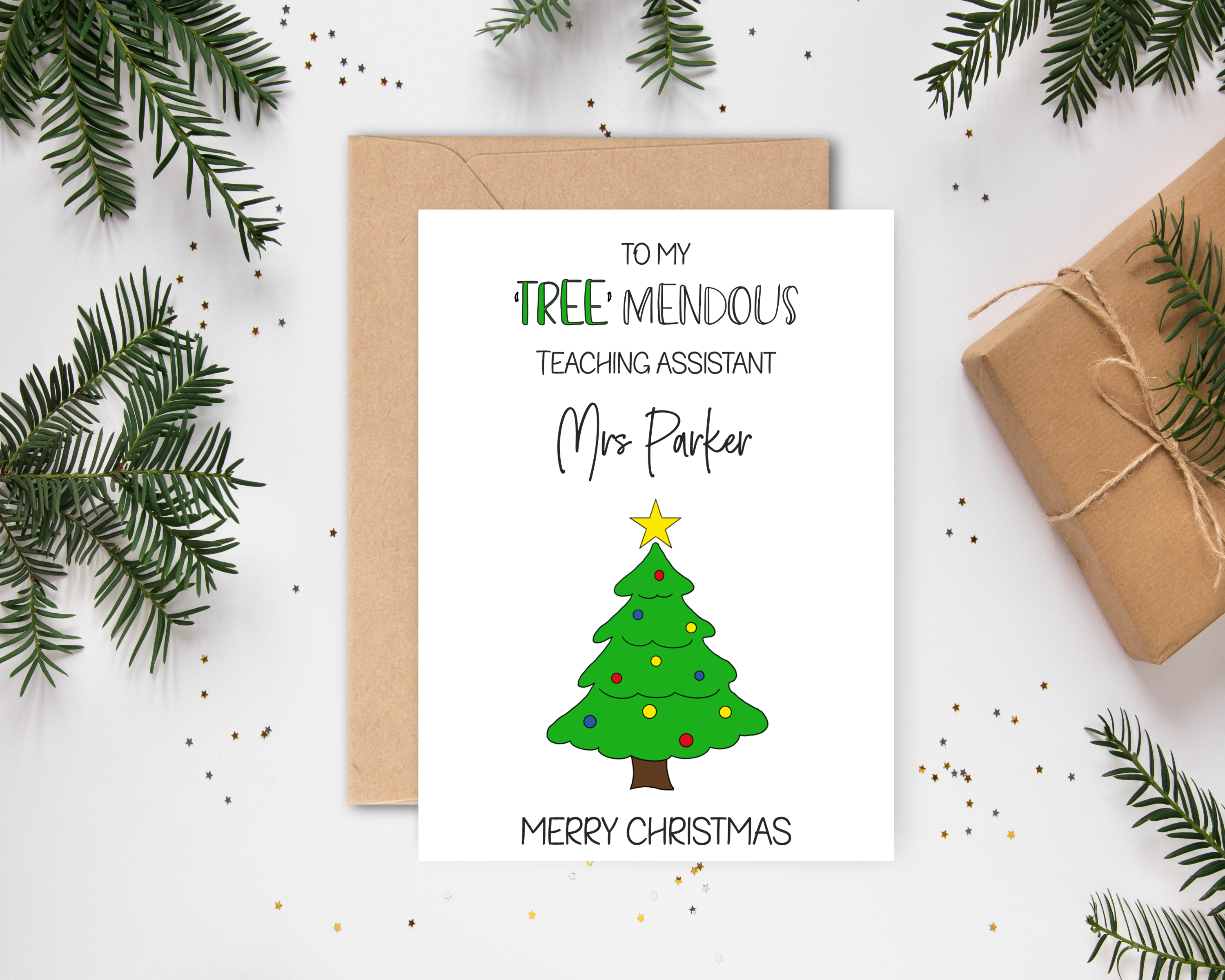 Poppleberry A6 'Tree-mendous' Personalised & Glittered Teaching Assistant Christmas Card on White Cardstock and Kraft brown Envelope.