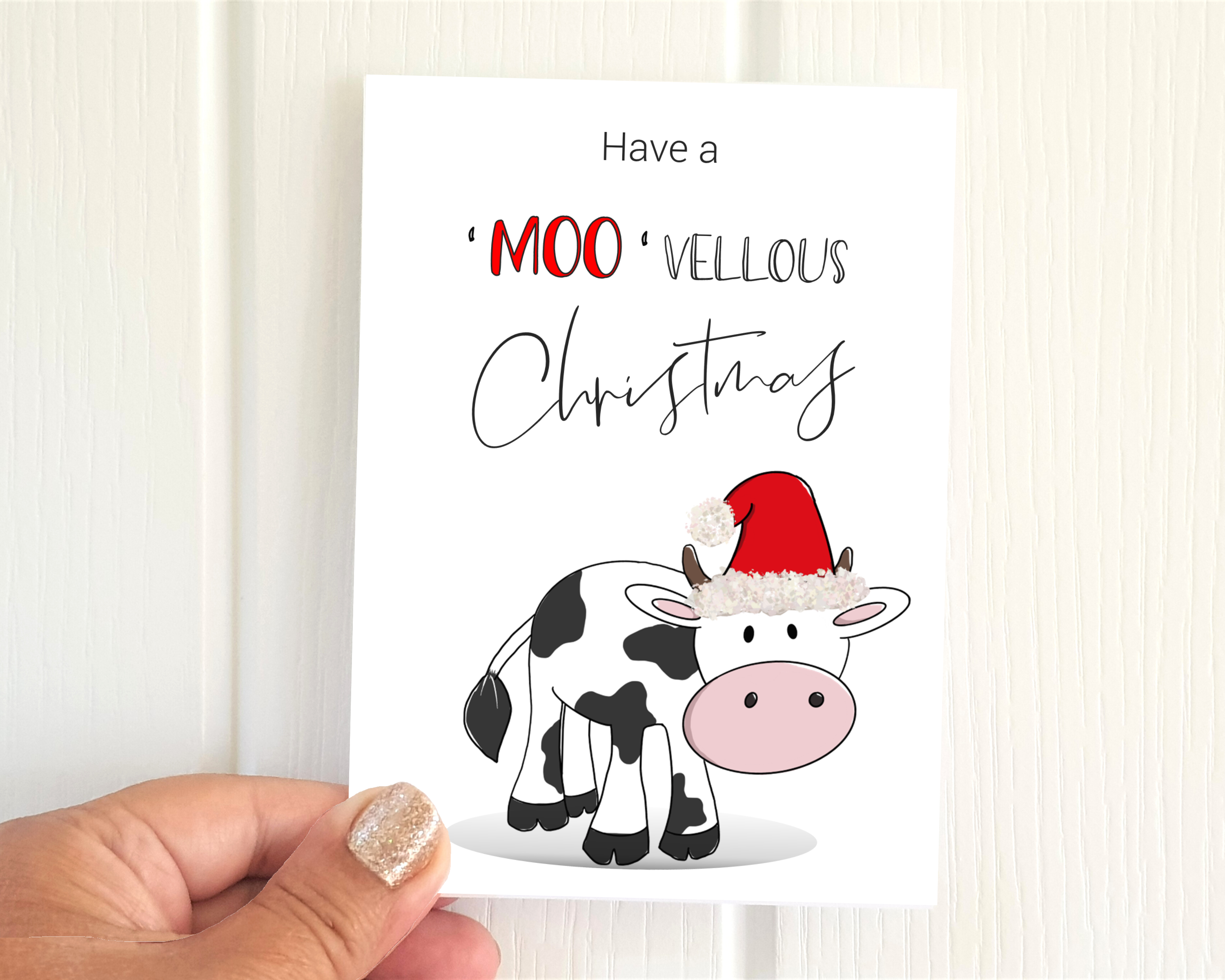 Poppleberry A6 'Moo-vellous Christmas' Christmas Cards on White Cardstock, Size Compared to Thumb.