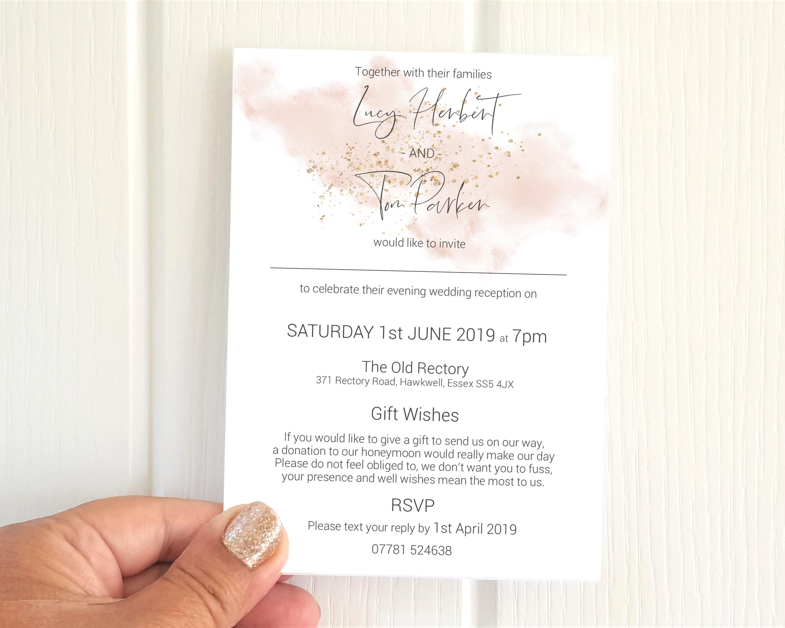 A watercolour blush pink A6 Poppleberry flat wedding evening/reception invitation, on white cardstock and held up.