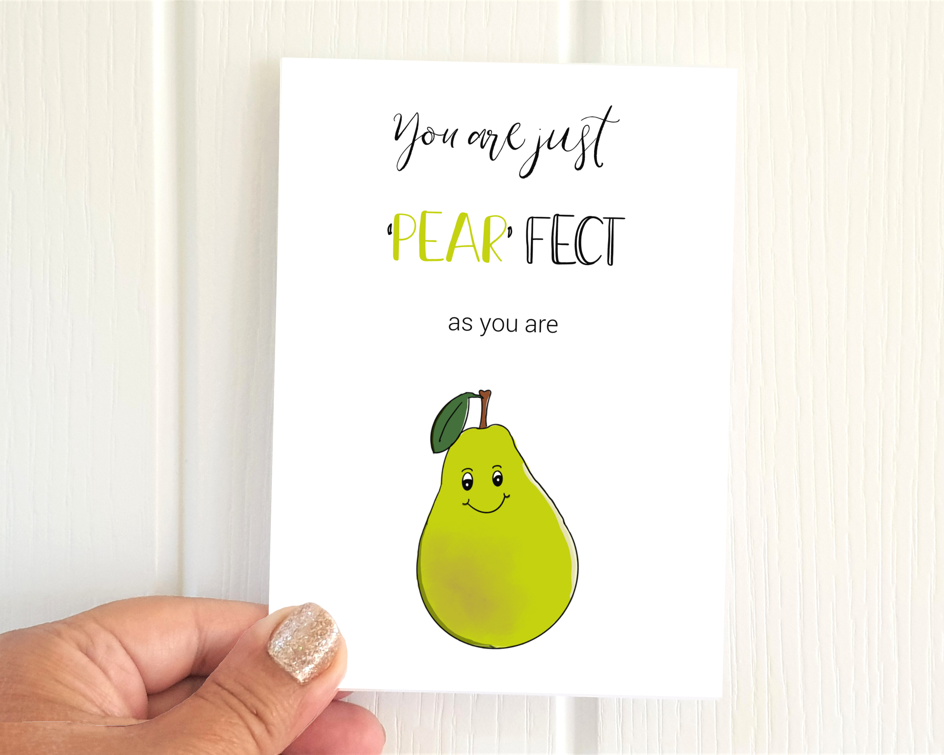 Poppleberry A6 'Just 'Pear' fect' positivity postcard, with a green pear illustration & pun, on white cardstock.