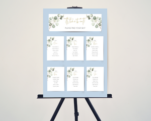 A set of Poppleberry watercolour eucalyptus wedding table plan cards, including 'top table' and 'A6 table' cards, on blue card backing & easel.