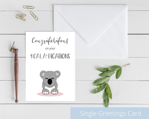 Open image in slideshow, Poppleberry A6 folded congratulations card, with a smiling koala digital illustration, on white cardstock and white envelope.
