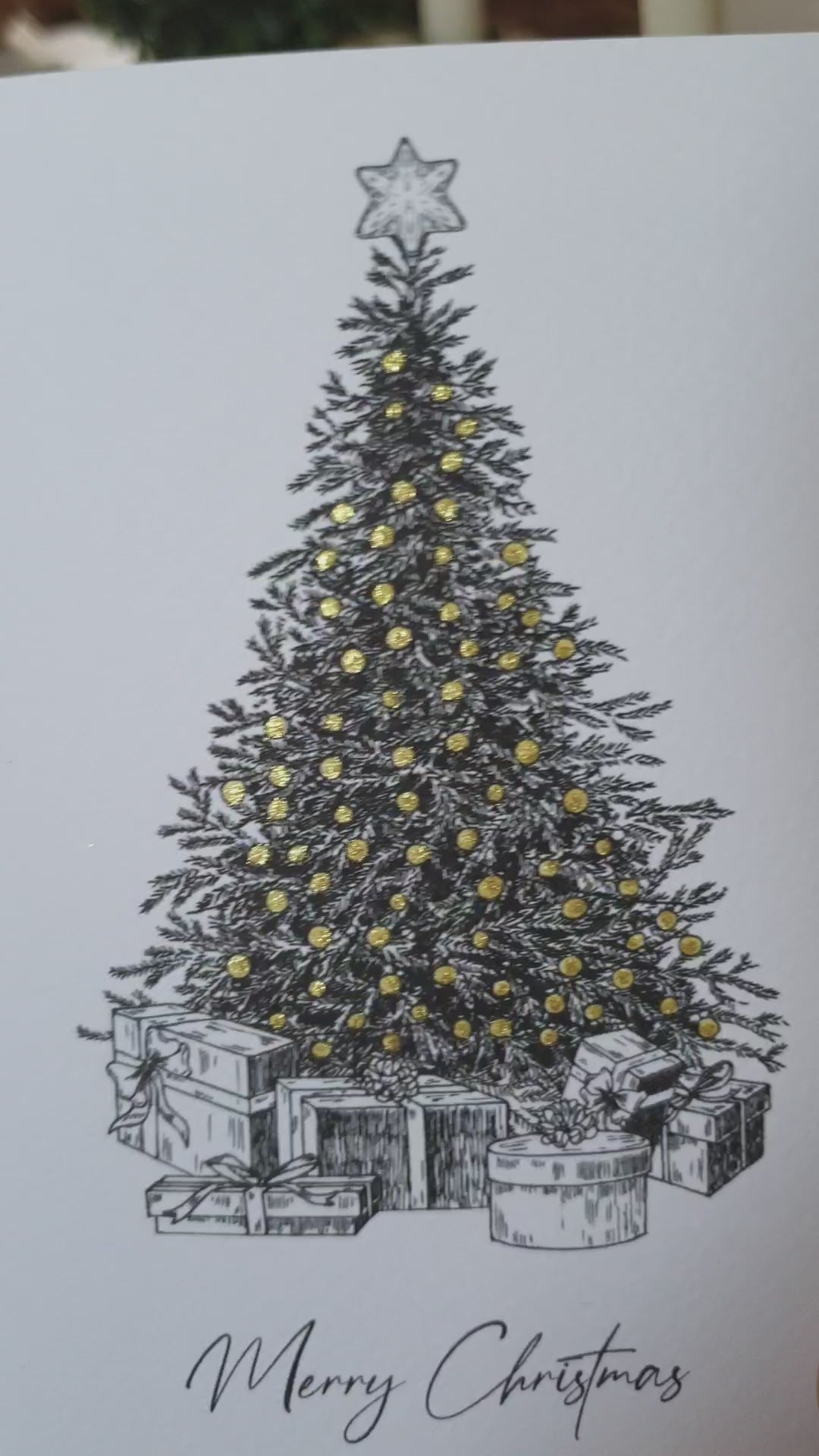 Poppleberry A6 Tree Illustration Golden Glittered Christmas Cards on White Cardstock, tilted to show glitter sparkle.